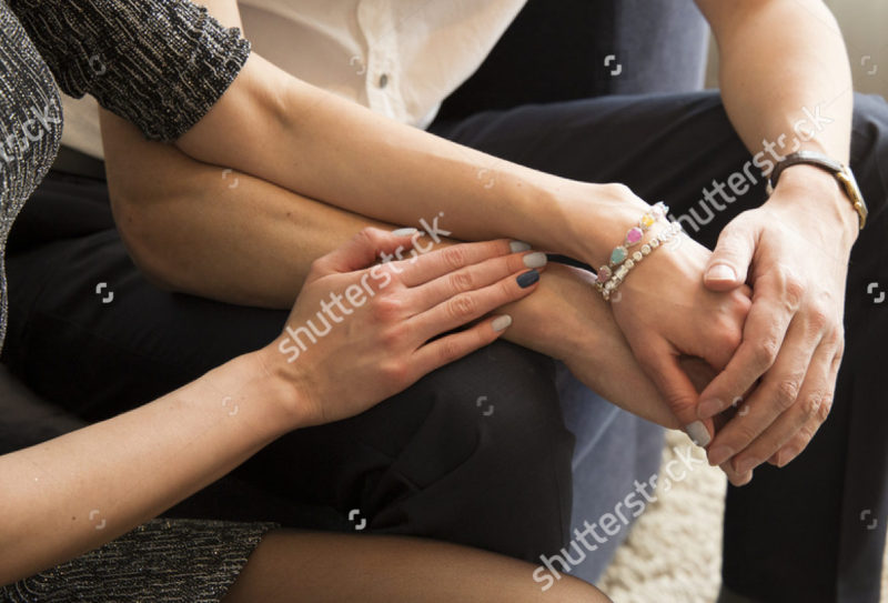 stock-photo-hands-of-lovers-437254396
